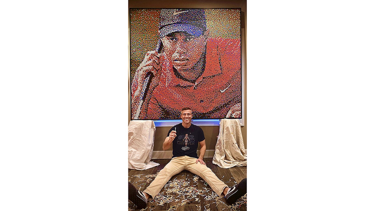 Tiger Woods mural and Aaron Norris