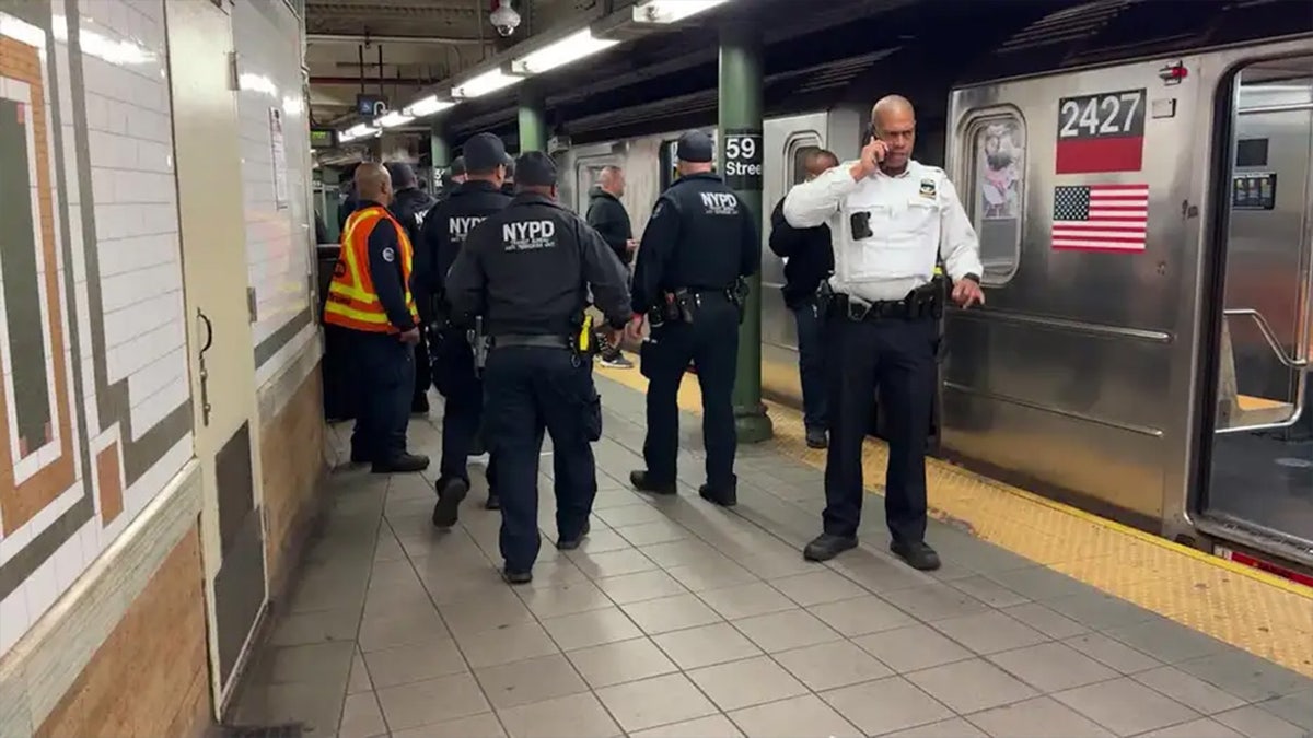 Police officers at subway station