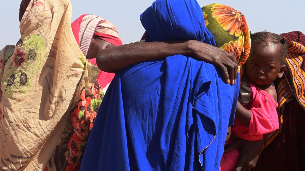 Women from El Geneina, West Darfur, weep