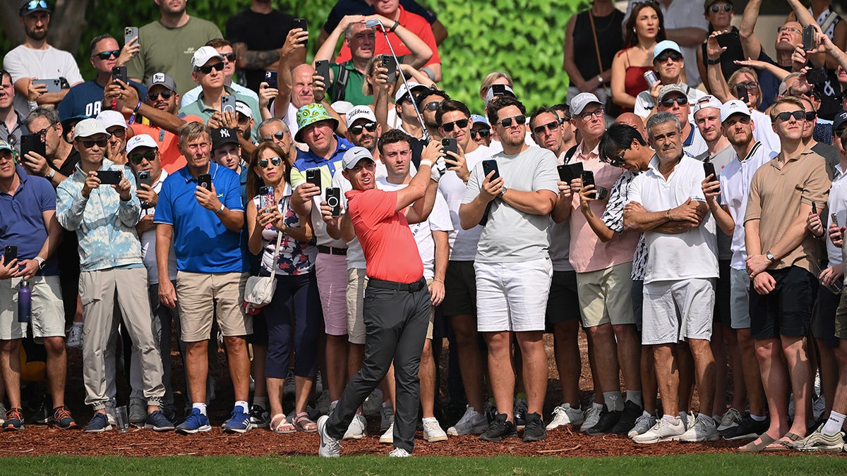 Rory McIlroy plays his second shot on the 2nd hole