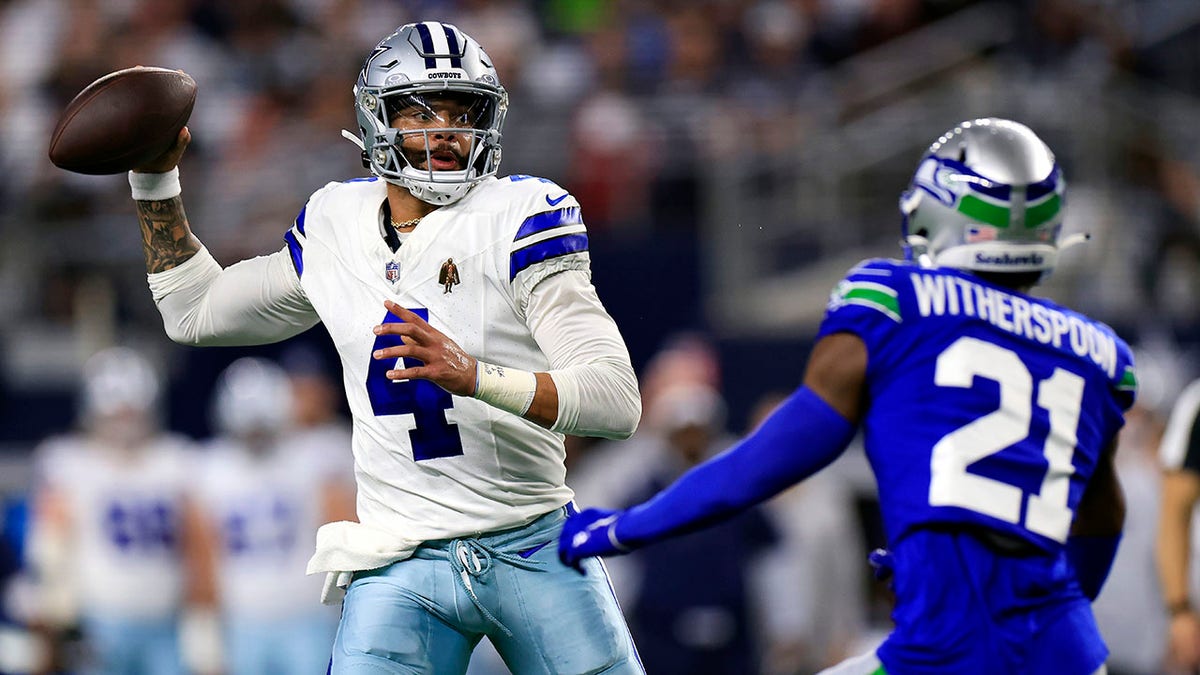 Dak Prescott looks to throw