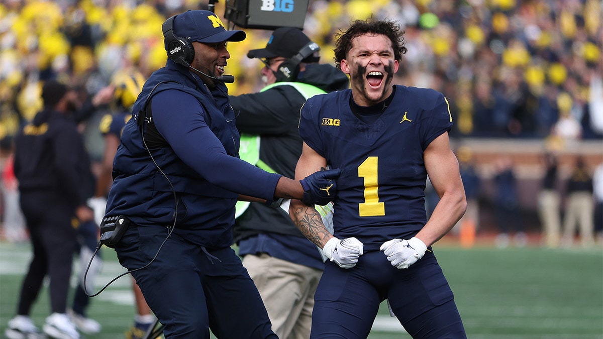 Roman Wilson celebrates against Ohio State