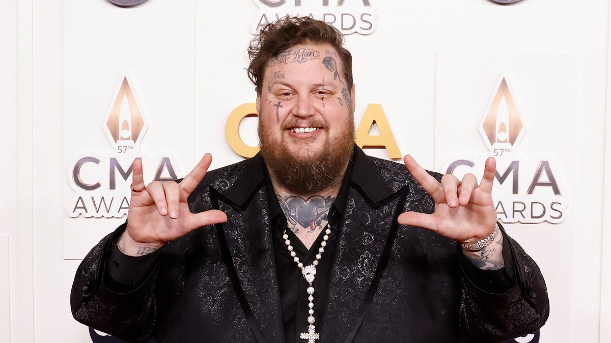 Jelly Roll puts up 'I emotion you' successful motion connection connected nan CMA Awards carpet