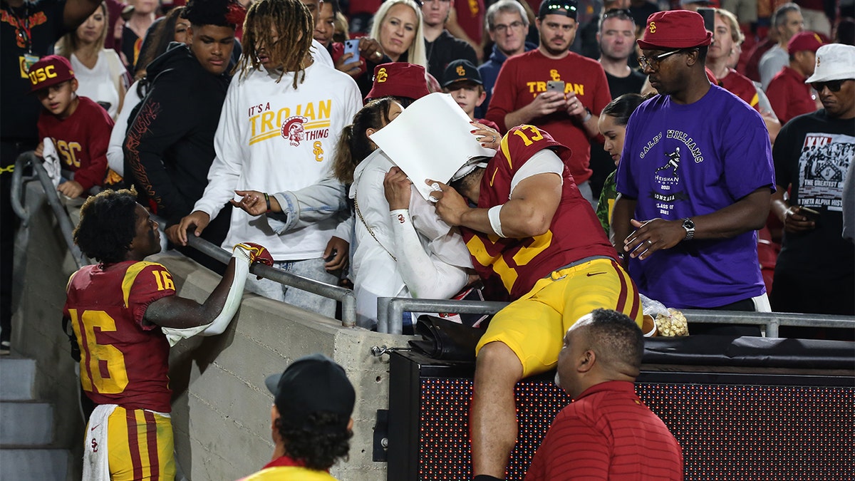 Caleb Williams shares a moment with his family