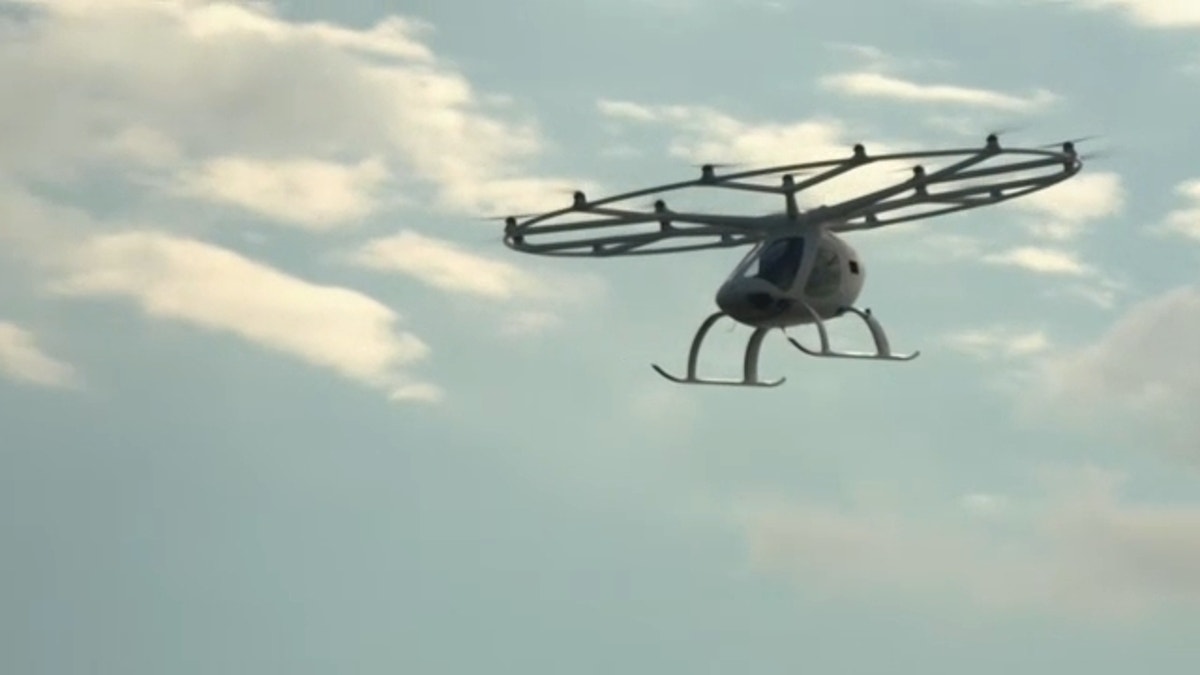 evtol aircraft flies by nyc heliport