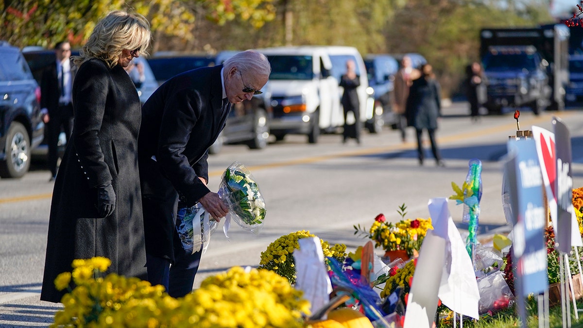Joe Biden placing flowers