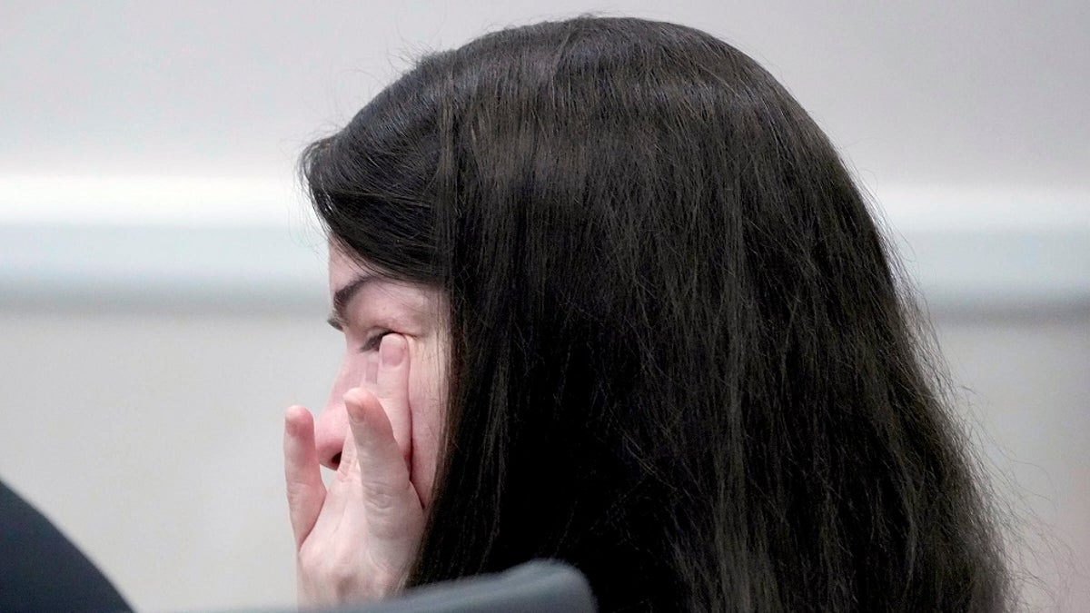 Jessy Kurczewski wipes away tears in a Wisconsin courtroom