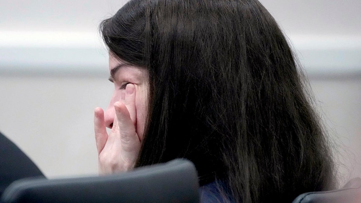 Jessy Kurczewski wipes away tears in a Wisconsin courtroom