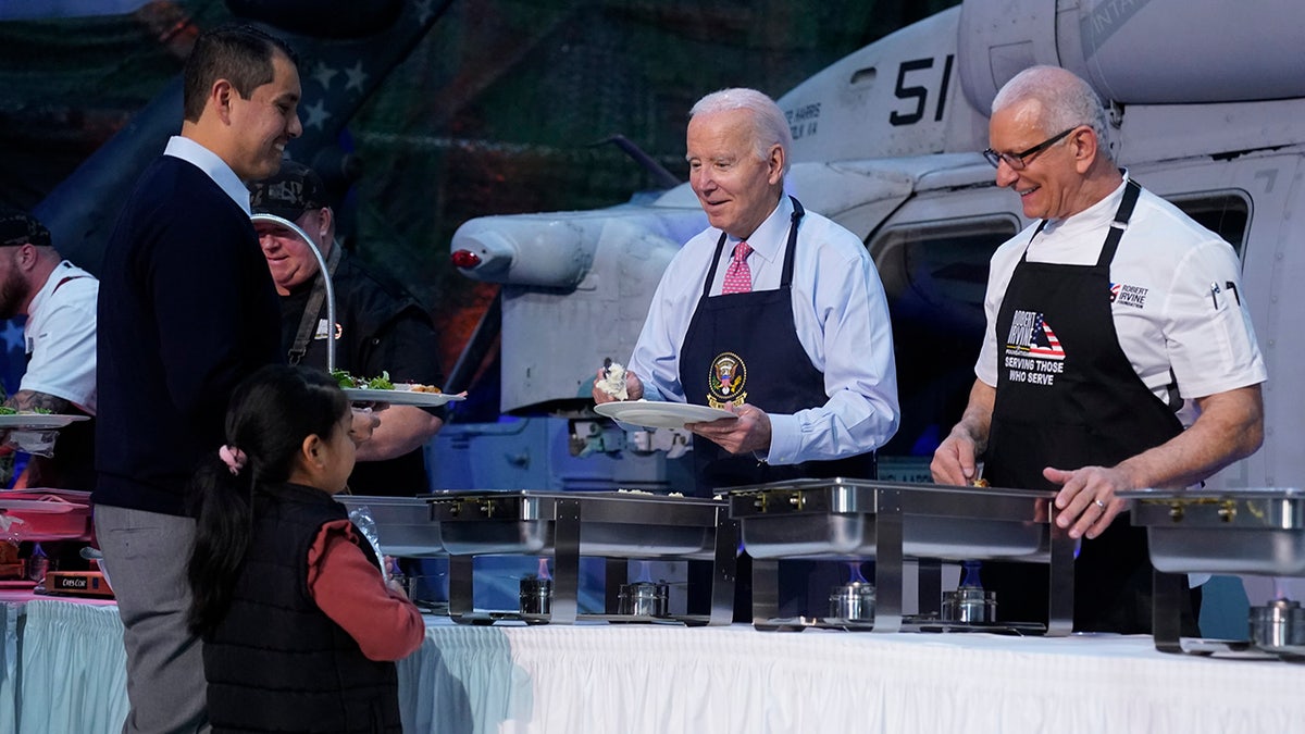Biden serves mashed potatoes