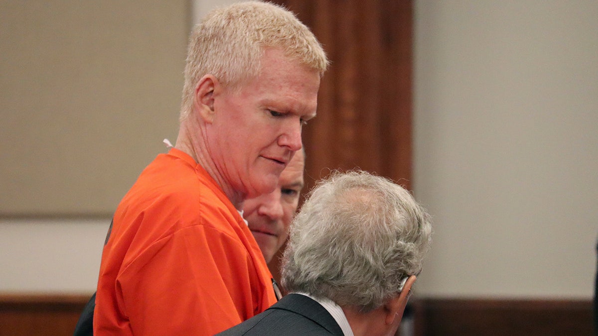 Alex Murdaugh in an orange jumpsuit.