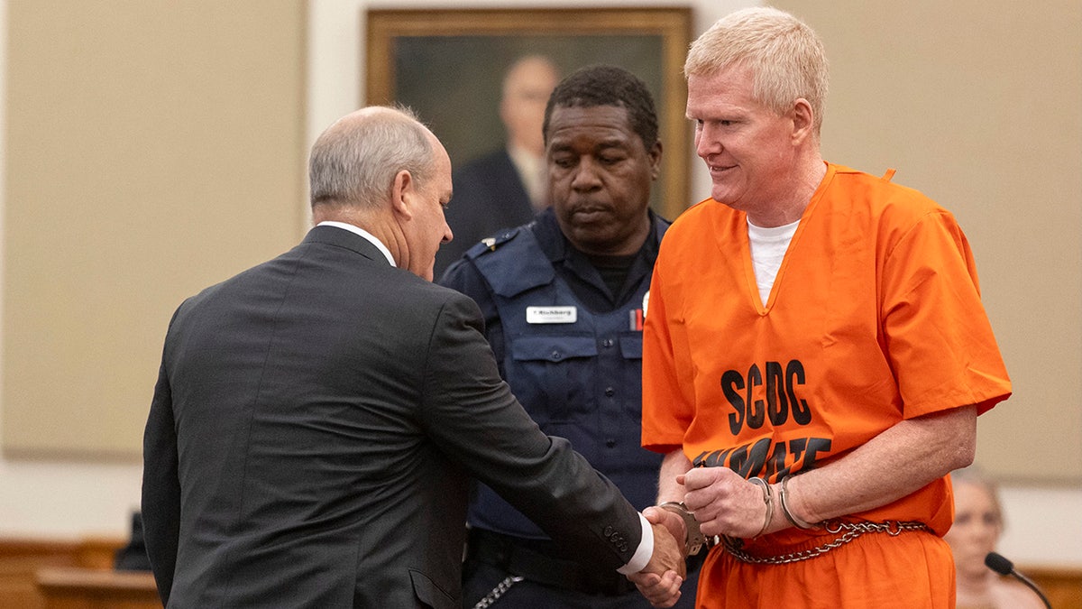 Alex Murdaugh shakes hands with his attorney Jim Griffin