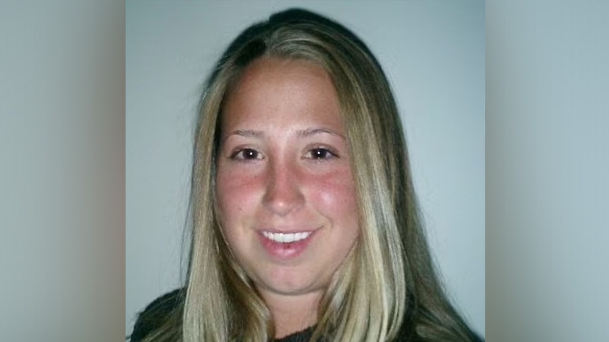 Headshot of Alyson Cranick smiling.