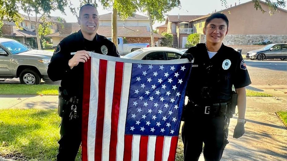 Officers with American flag