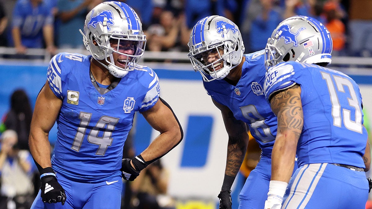 Lions players celebrate