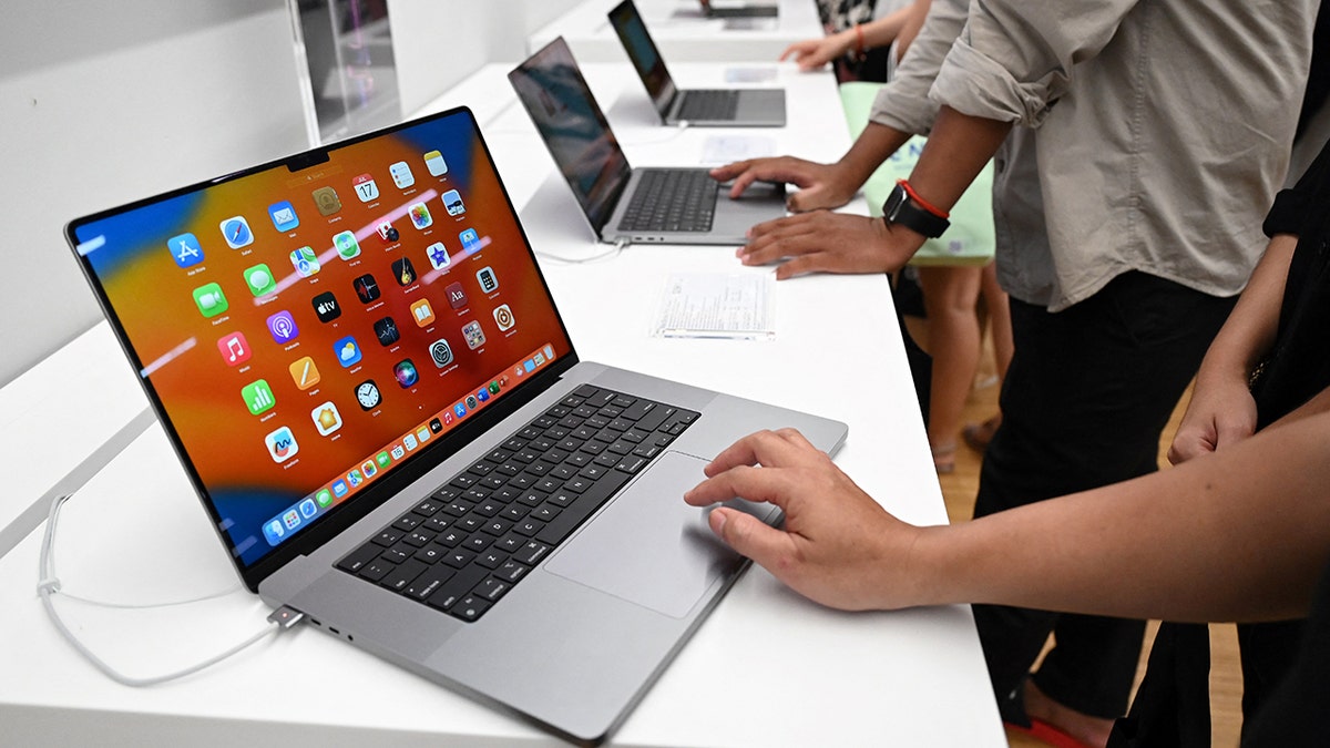 Apple Macbook laptops are seen in Cambodia