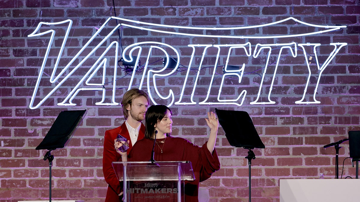 Billie Eilish under a Variety sign