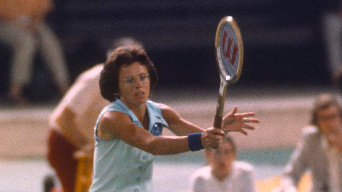 Billie Jean King hits ball