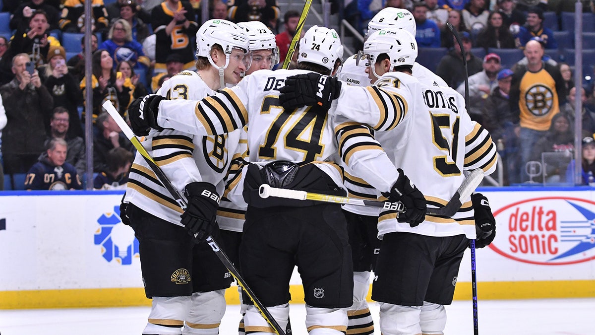 Bruins players celebrate