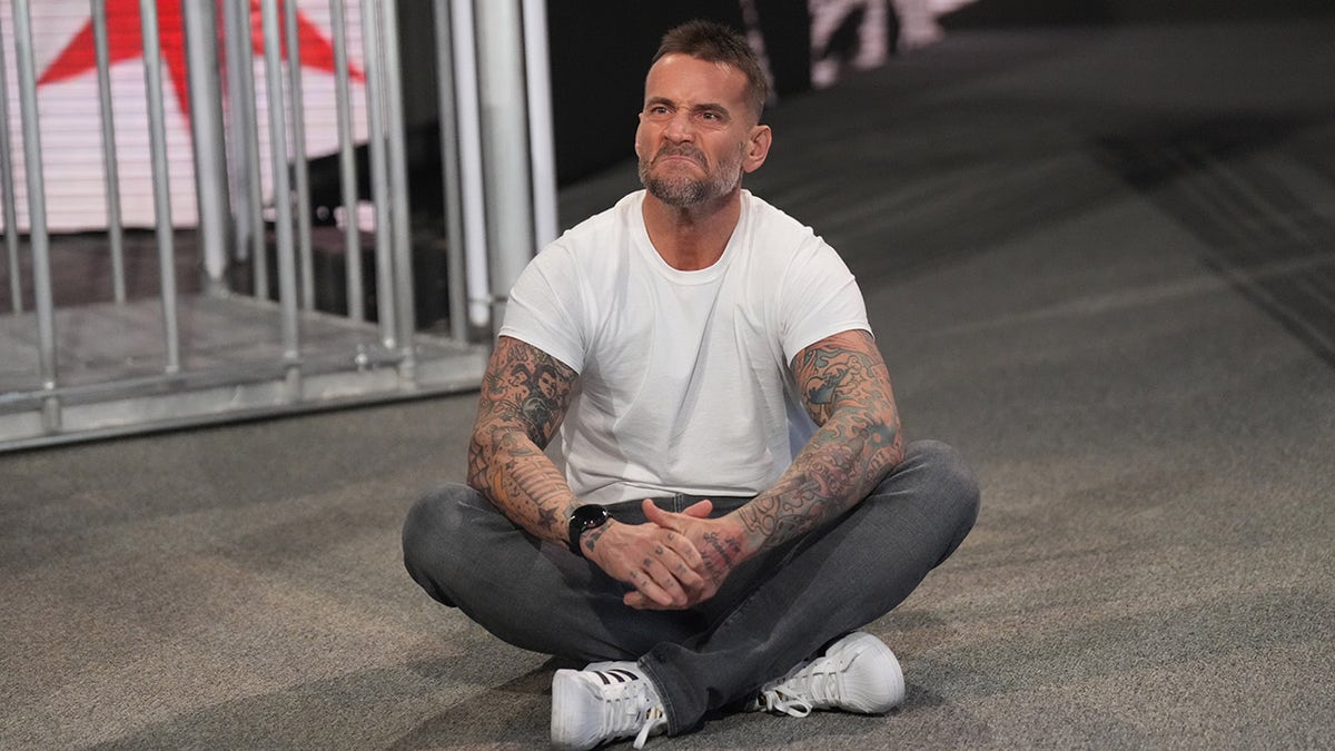 CM Punk sits