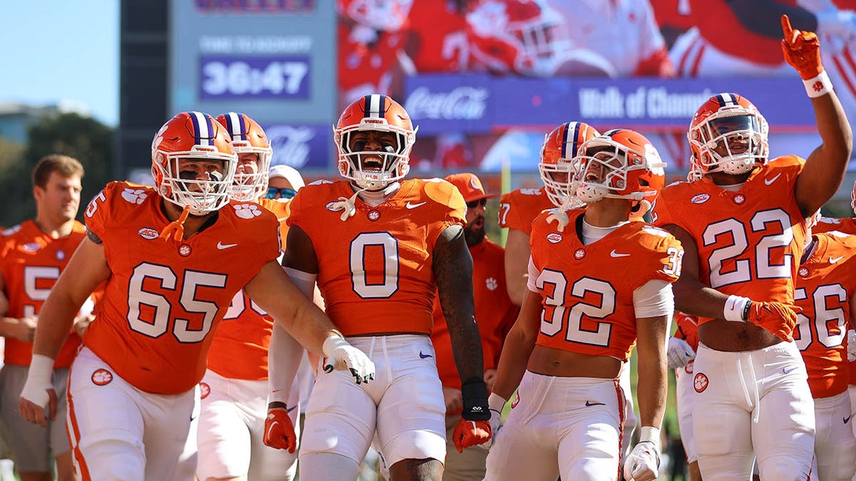 Fans storm the field after Clemson pulls off upset of Notre Dame in thriller 1 Clemson Tigers seen before the start of a game