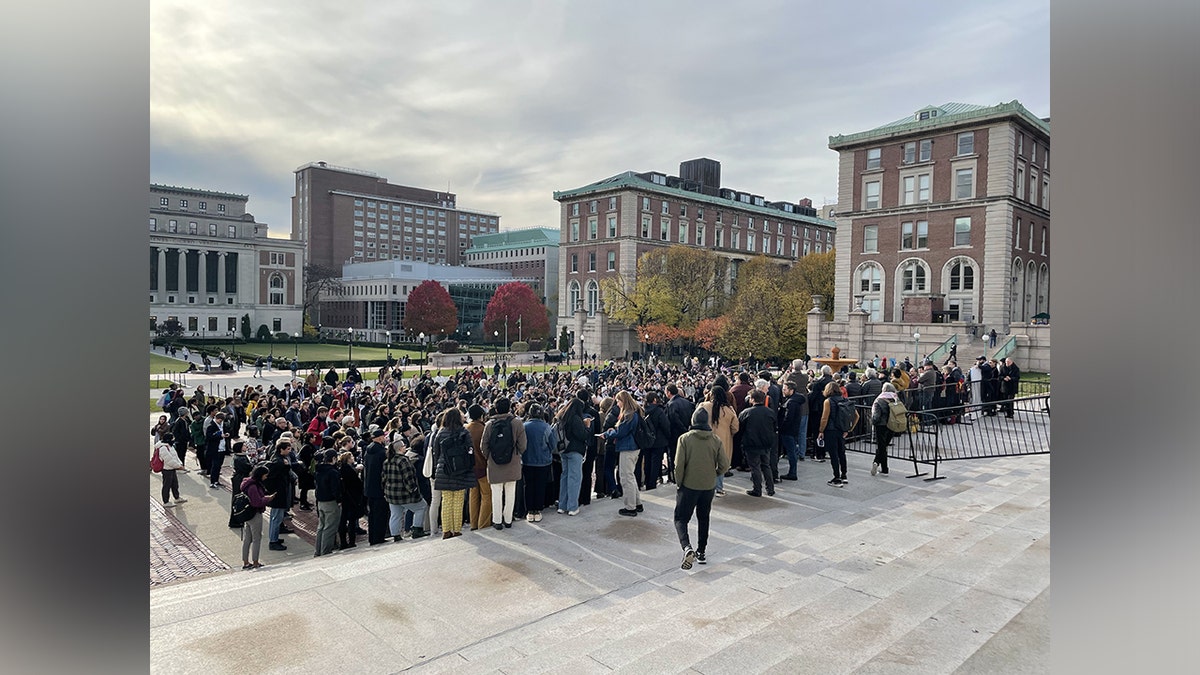 Columbia University students and faculty protest the removal of two pro-Palestinian groups groups