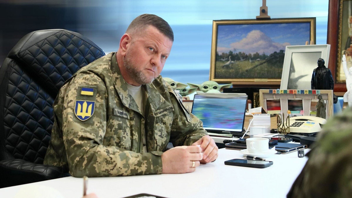 Valery Zaluzhny, Ukraine's top general, sitting down a meeting