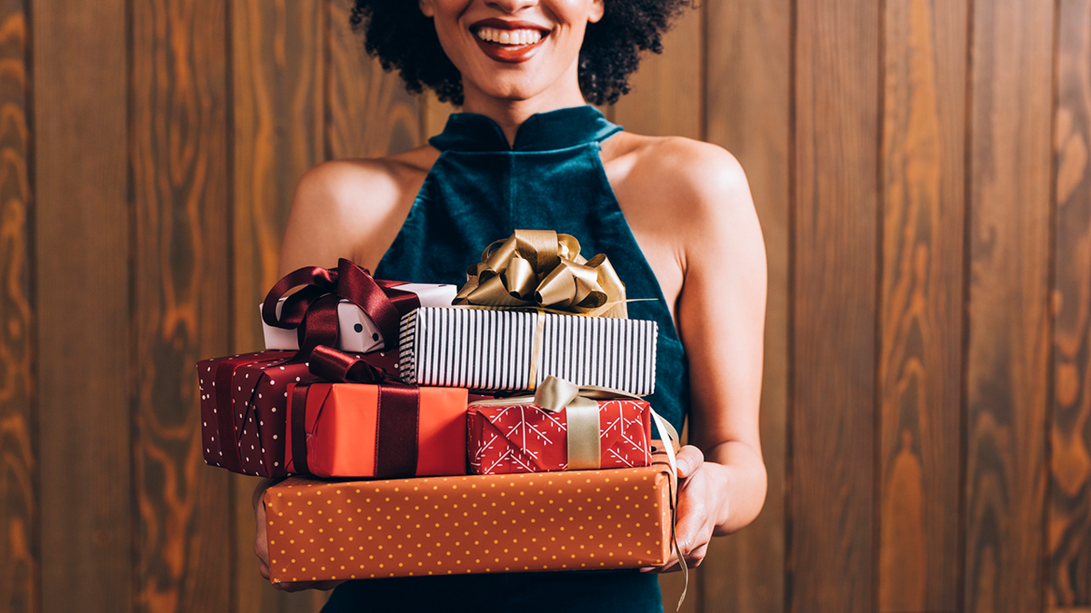 person holding presents