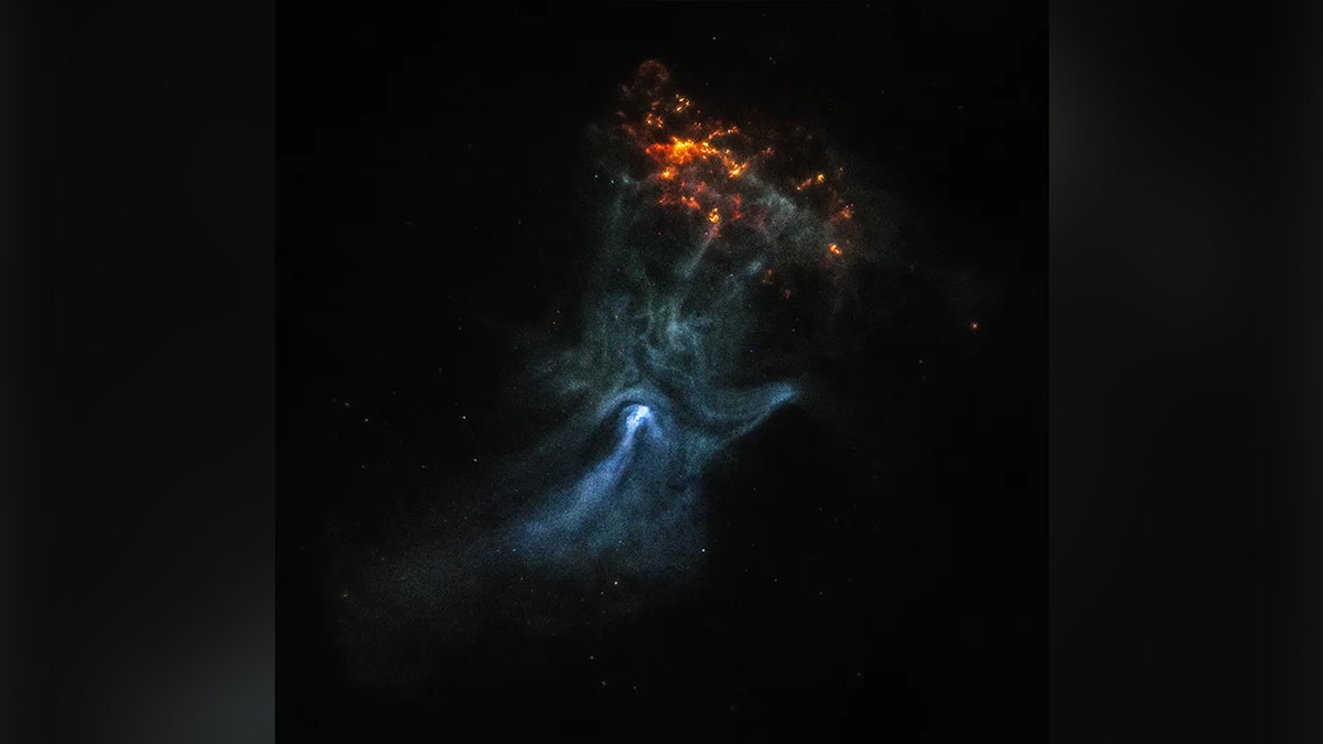 An x-ray generated image of a collapsed star in space that looks like a hand
