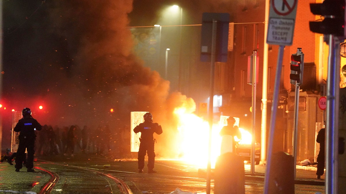 Car burns in Dublin, Ireland amid riots