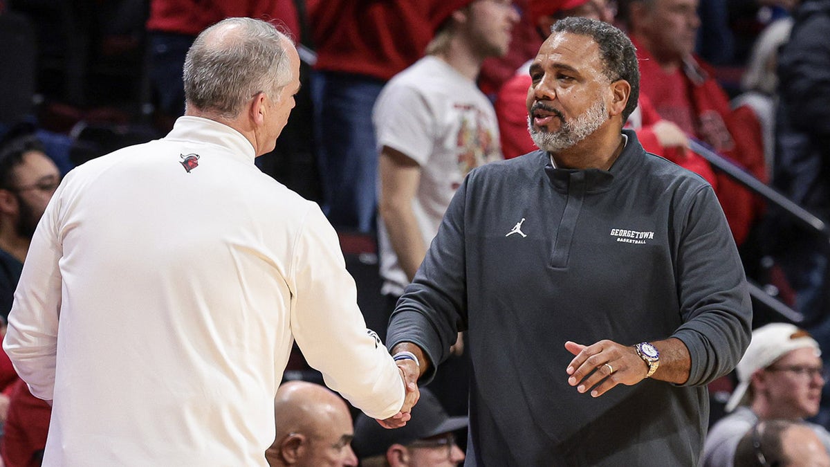 Ed Cooley shakes hands