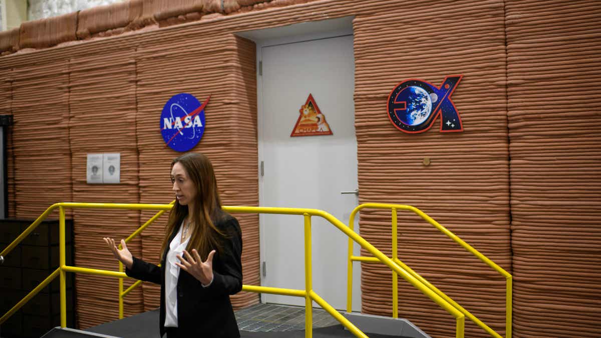 Exteriror of the Mars Dune Alpha dwelling. It is made from burnt orange colored concrete