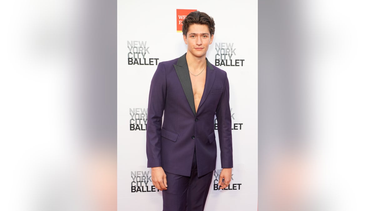 31-year-old Netflix star diagnosed with brain tumor Barton Cowperthwaite posing on the red carpet