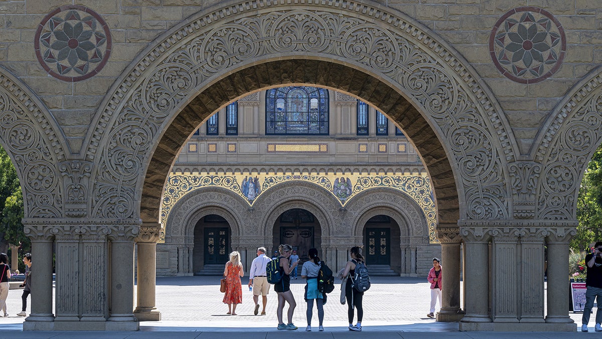 Stanford students walk campus