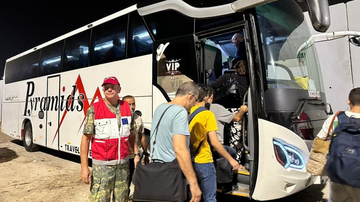 Refugees boarding bus in Egypt
