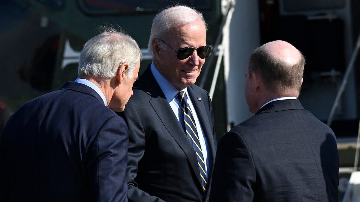 Sen. Coons greets Biden in Delaware