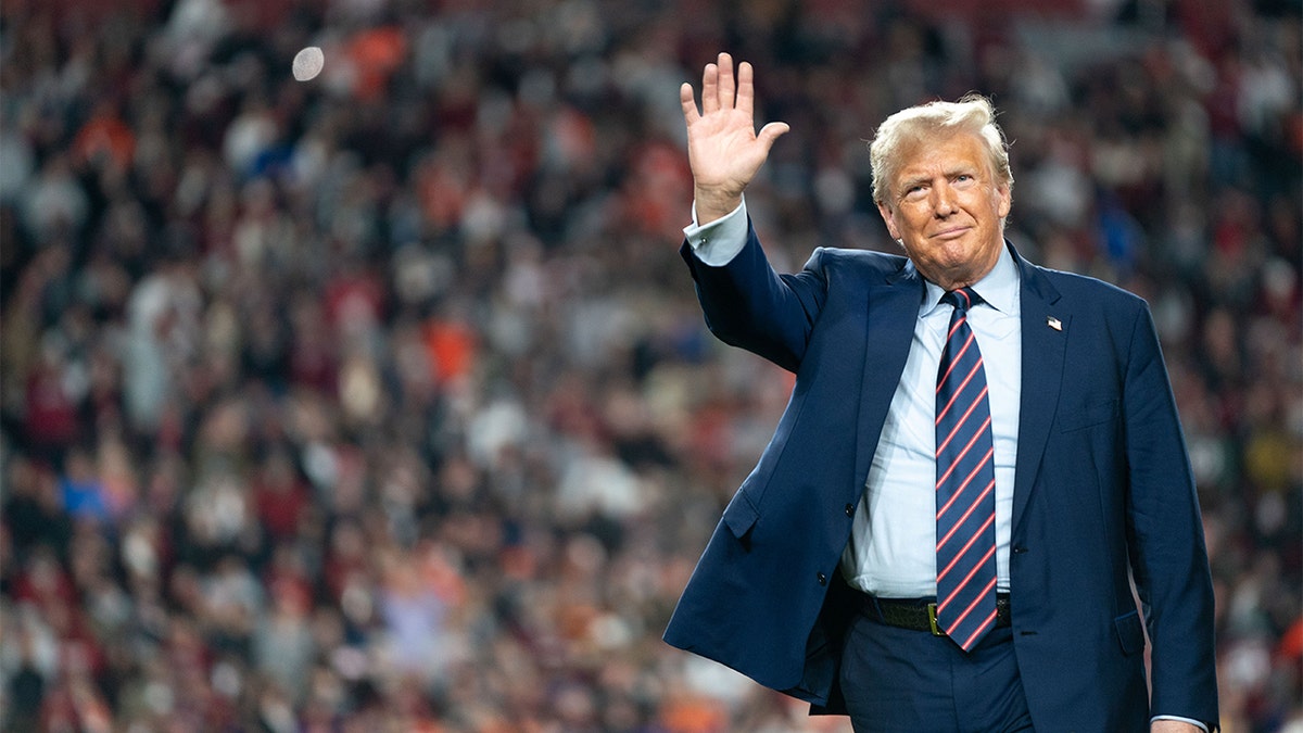 Former President Donald Trump waves