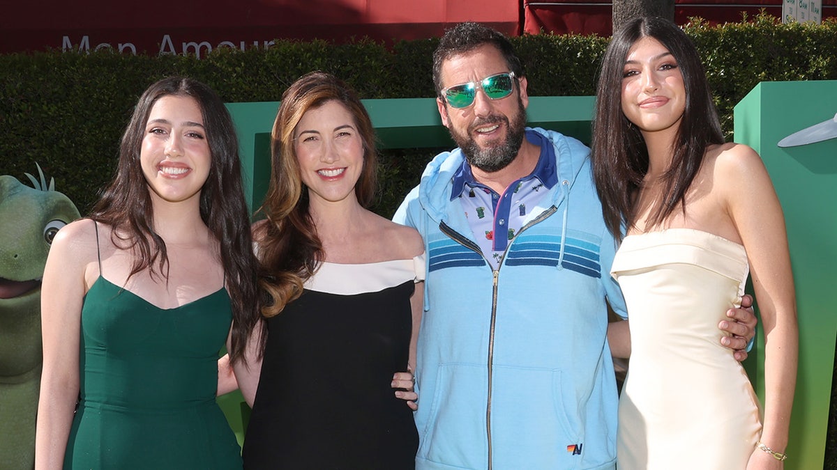 A photo of Adam Sandler with wife Jackie and daughters Sadie and Sunny