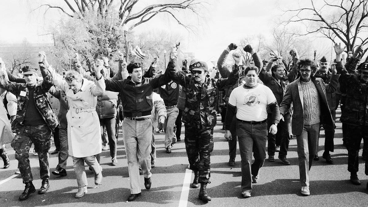 Veterans walking down street