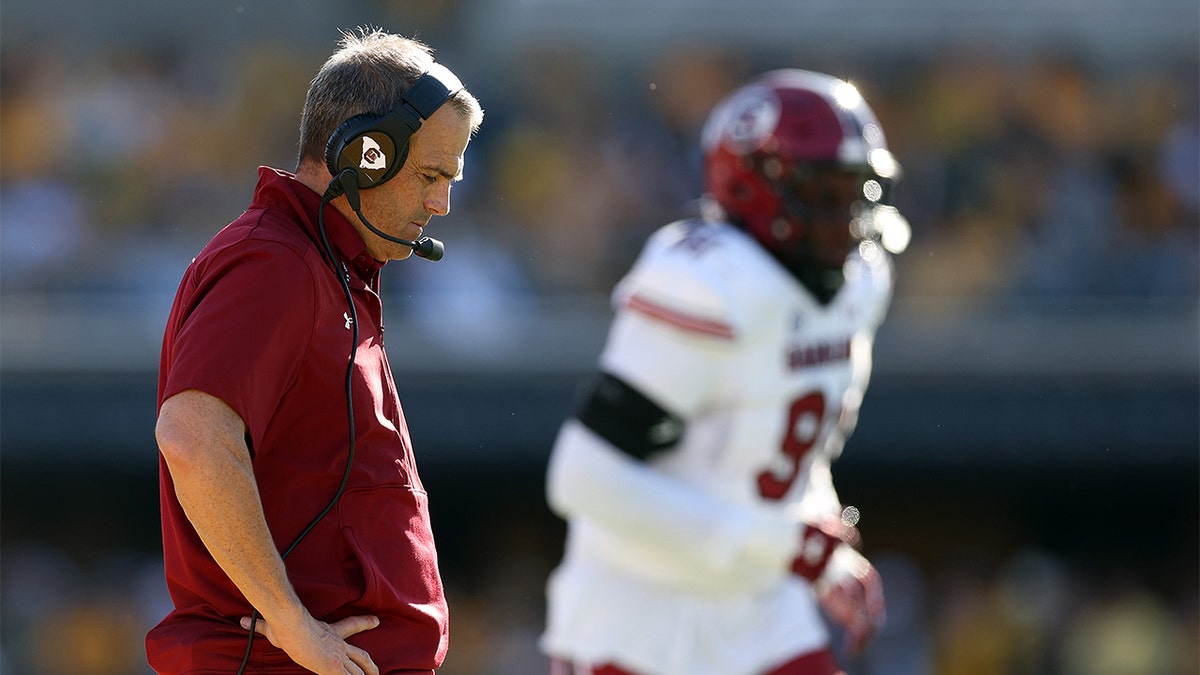 Shane Beamer hangs his head