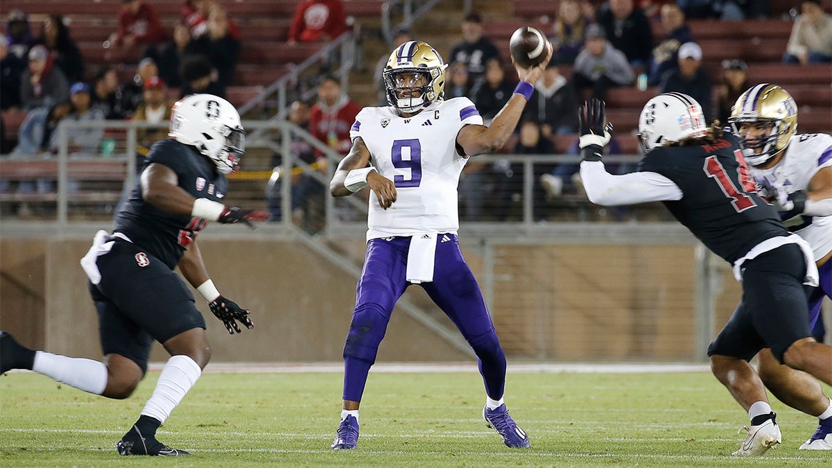 Michael Penix throws against Stanford