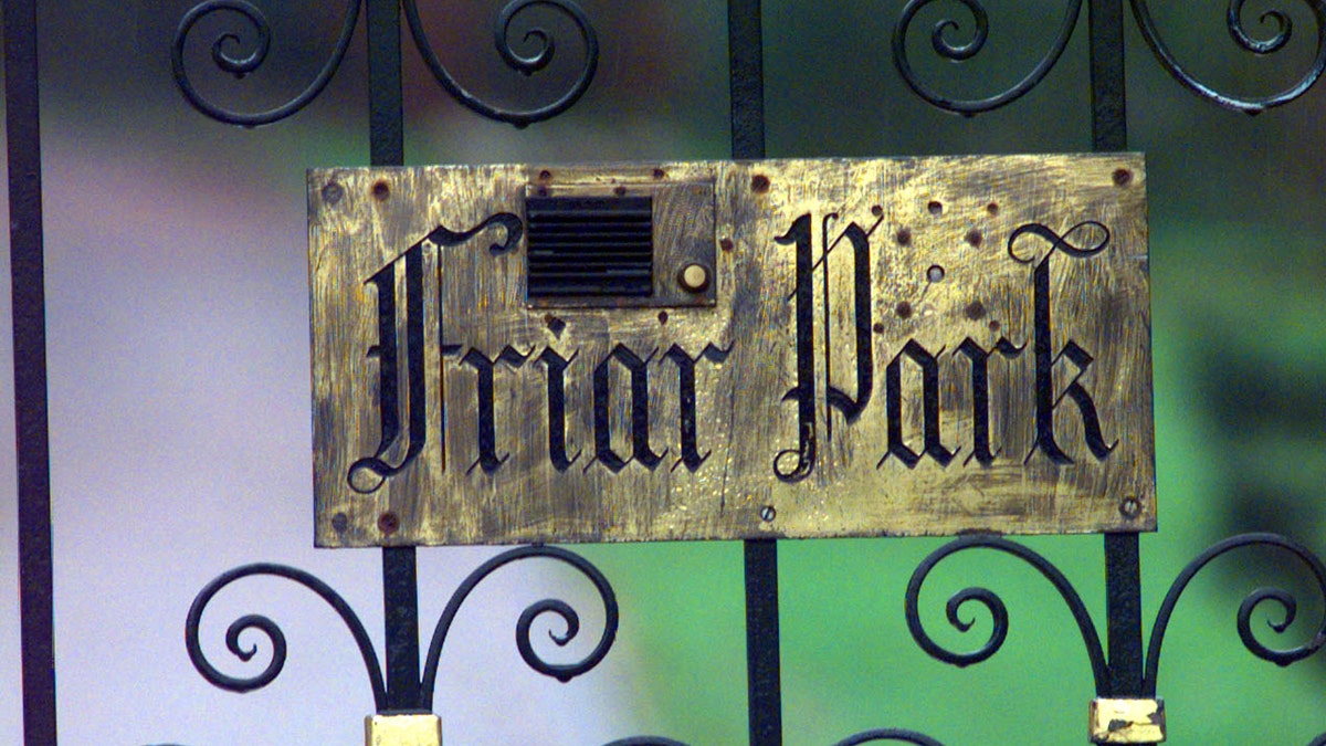 a close-up of the Friar Park sign
