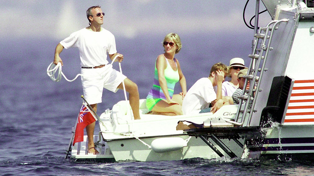 Princess Diana on a yacht wearing a colorful swimsuit