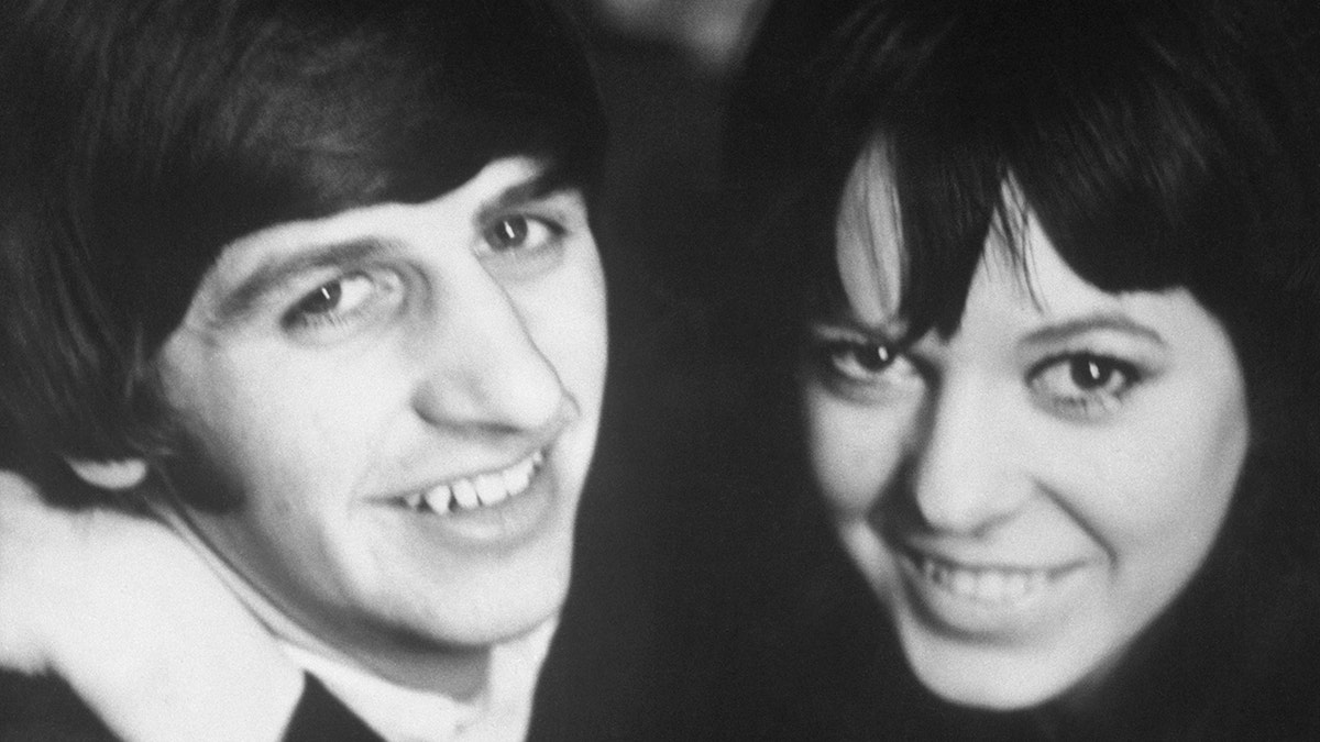 A close-up of Ringo Starr and Maureen both smiling