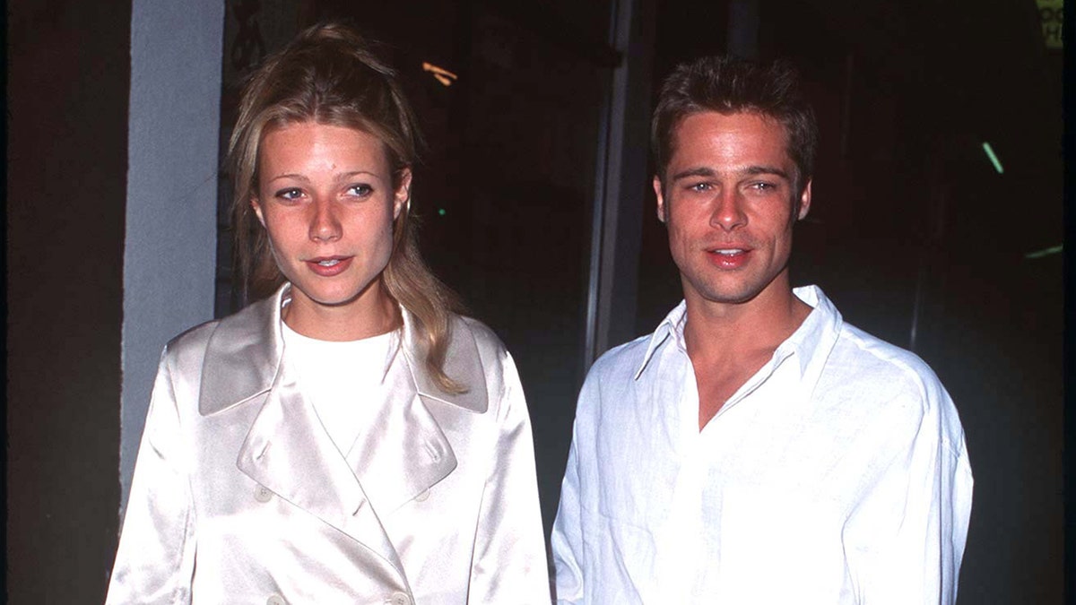 Gwyneth Paltrow and Brad Pitt arrive at an event