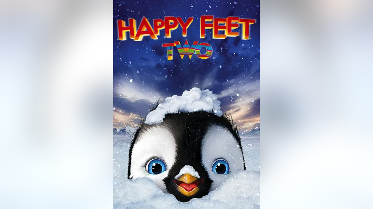 Cover of "Happy Feet 2" with penguin