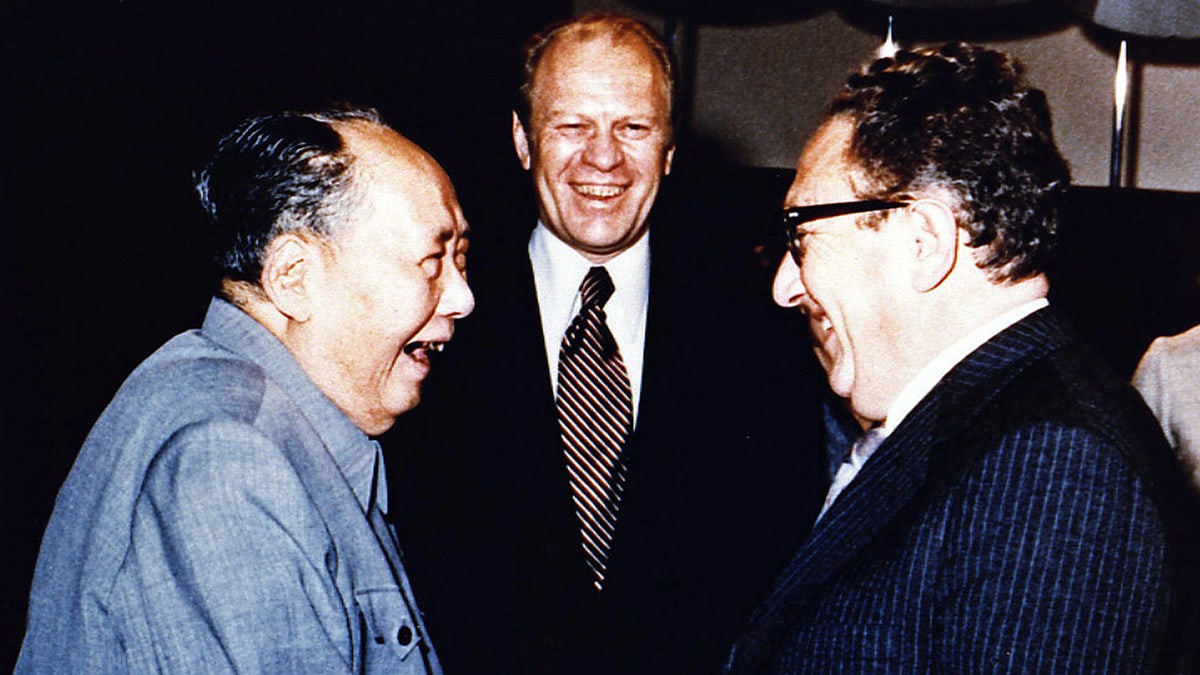 Henry Kissinger with Mao Tse-Tung