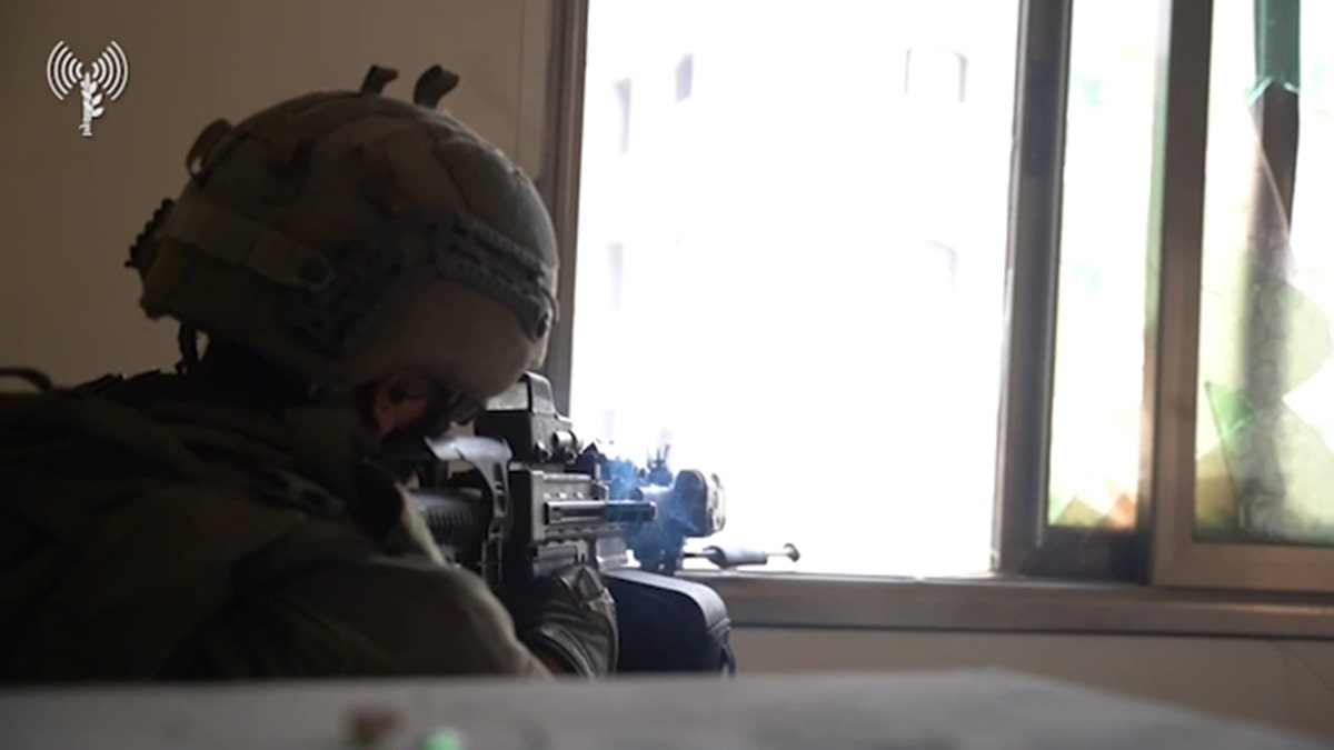 IDF soldier fires gun inside Al-Shifa Hospital in Gaza