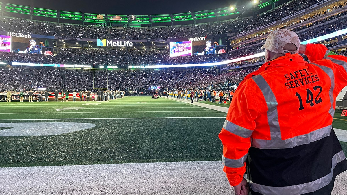 metlife worker salutes flag