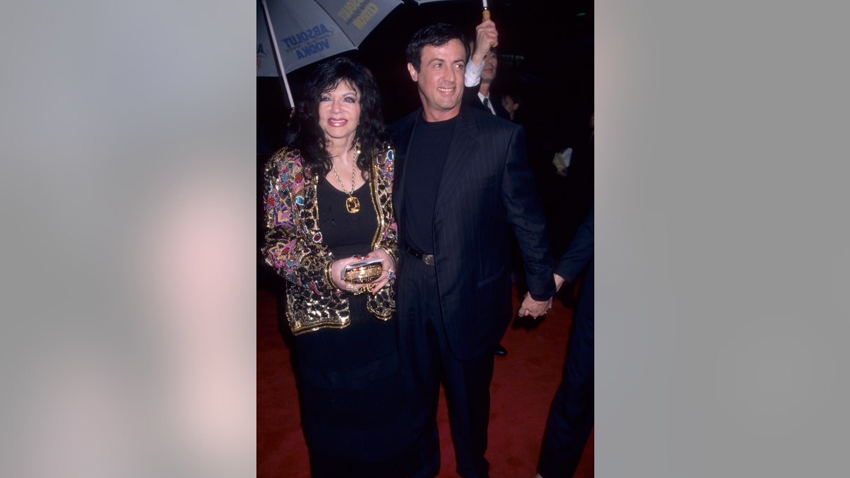 Jackie Stallone walking the red carpet with Sylvester Stallone