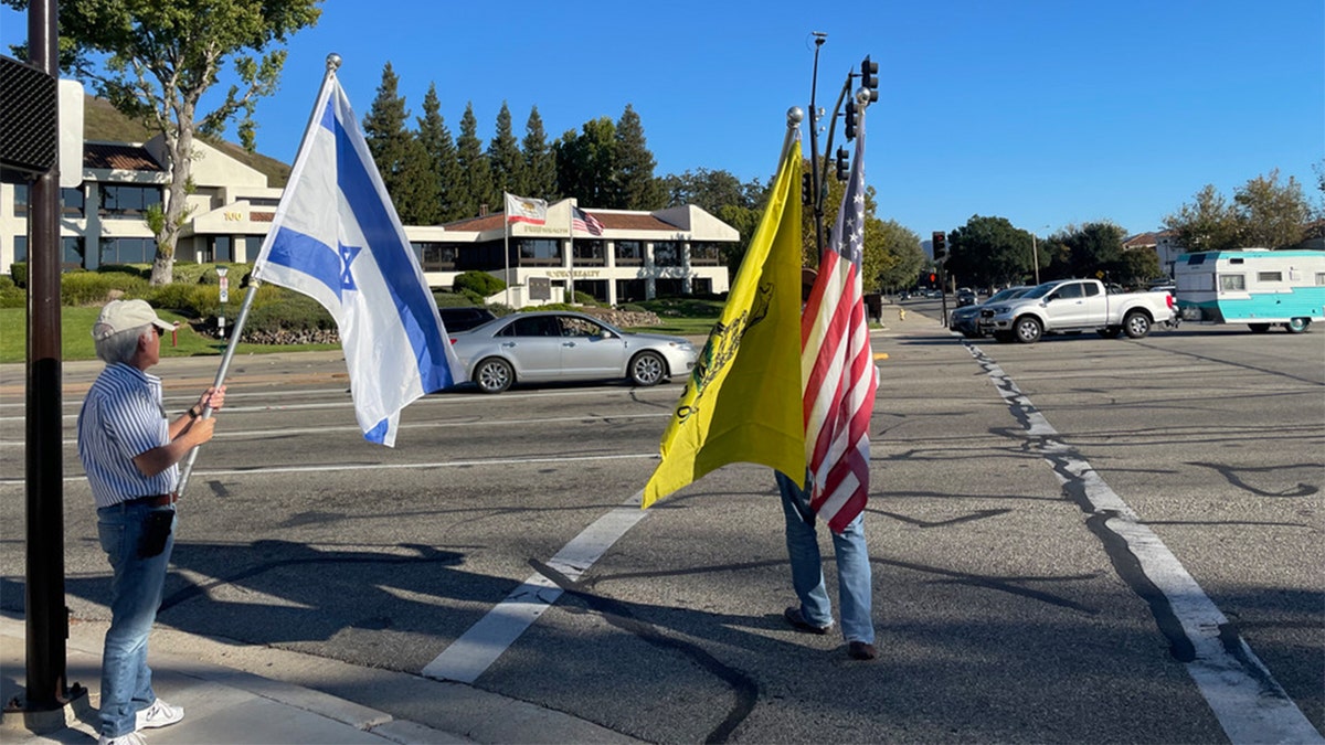 Elderly Jewish man dies after confrontation with pro-Palestinian protester at California rally Man holding Israeli flag
